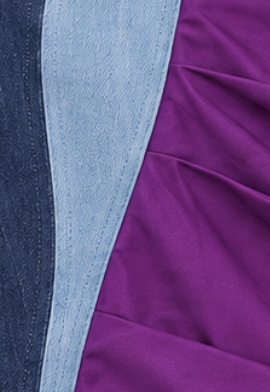 Detalle del tejido: Denim de distintos tonos y tafetán morado 